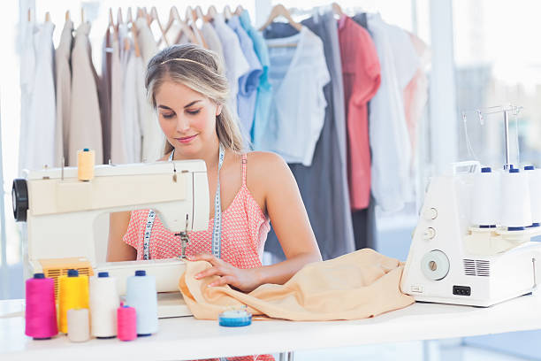 istock Fashion designer sewing 460897815
