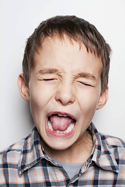 istock Young Boy Close-Up Making Silly Face, Tantrum 460899201