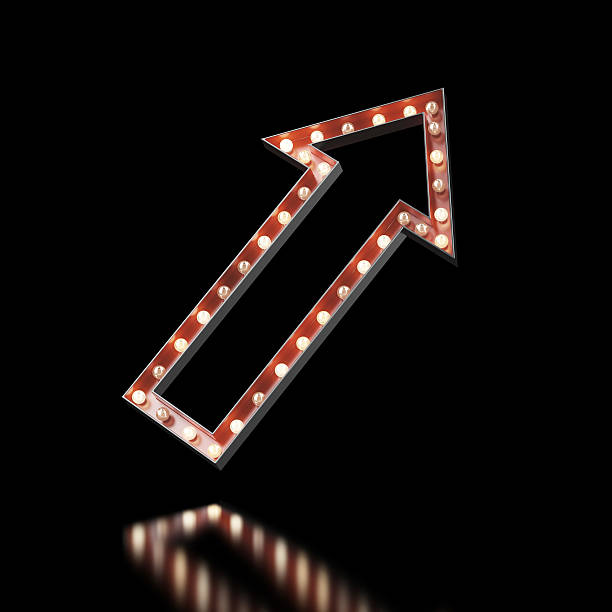 istock Red arrow sign lit up on a black background 460899475