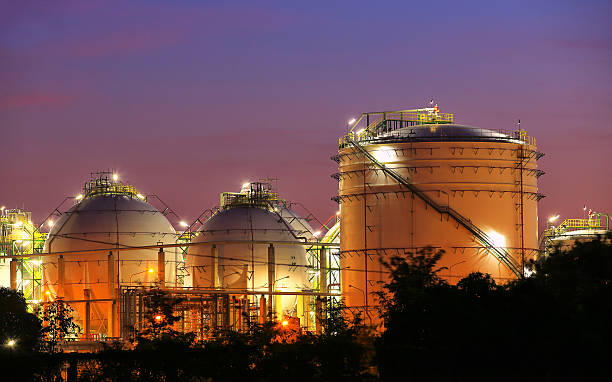 istock Chemical industrial storage sphere tanks at twilight time 460937449