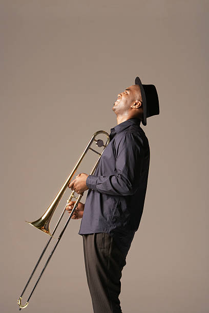 istock Happy African American Man With Trombone 460938203