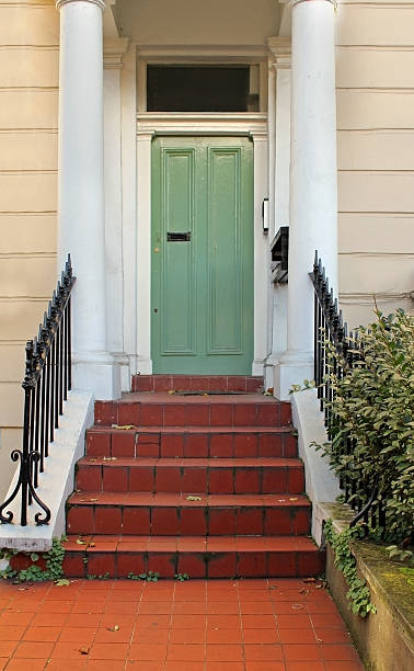 istock Green house door 460938953