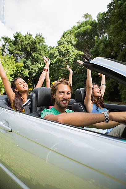 istock People having fun in the cabriolet 460957599