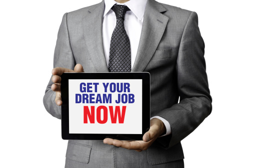 Businessman holding tablet pc with 