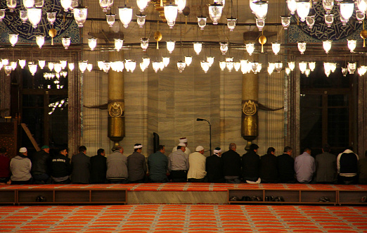 Istanbul, Turkey - October 25, 2012: Muslims prays in Suleymaniye Mosque in Turkey.