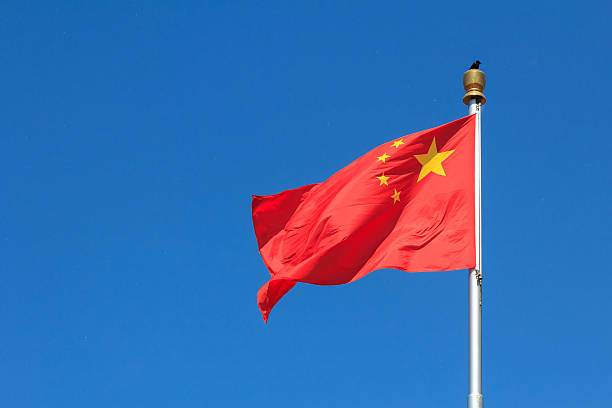 Chinese national flag Chinese national flag in Tiananmen square chinese flag stock pictures, royalty-free photos & images