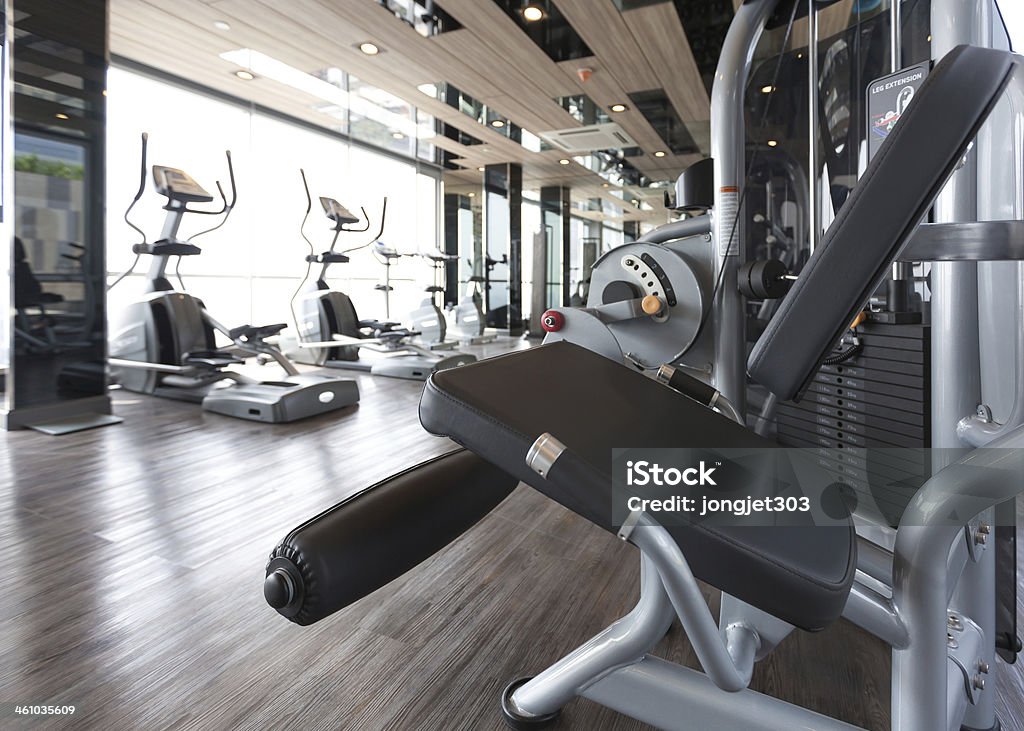 diverse equipment and machines at the gym room Exercising Stock Photo