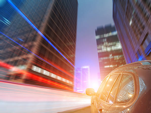 istock car driving on a motorway at high speeds 461051683