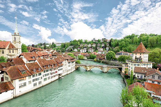 istock Church, bridge and houses with tiled rooftops, Bern, Switzerland 461058893