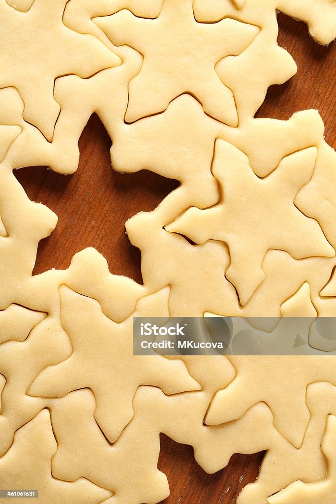 Cookies baking Pastry for Christmas cookies and snowflake shapes. Baked Pastry Item Stock Photo