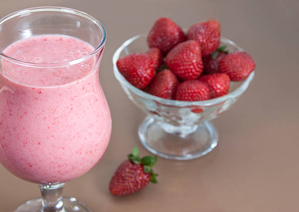 istock Banana smoothie with strawberries and yogurt. 461066393