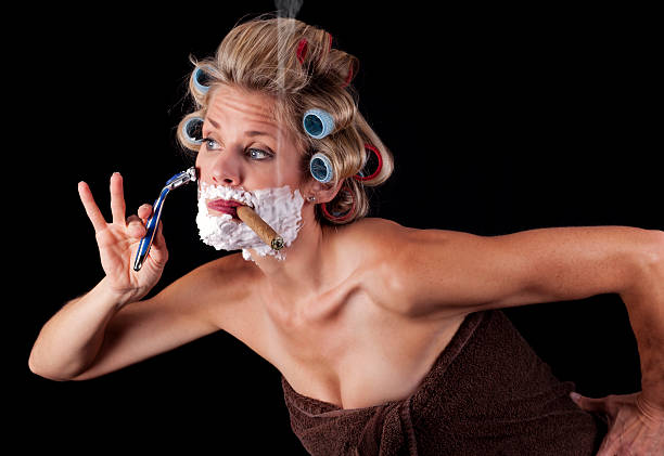 istock Blonde Woman Shaving 461081019