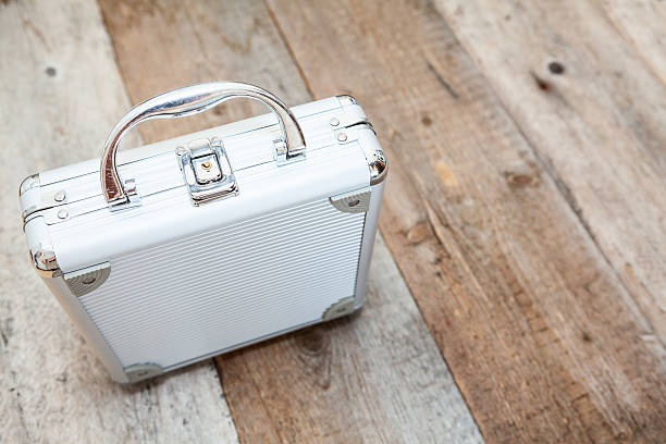 istock Aluminum suitcase standing on wooden floor, copyspace 461092767
