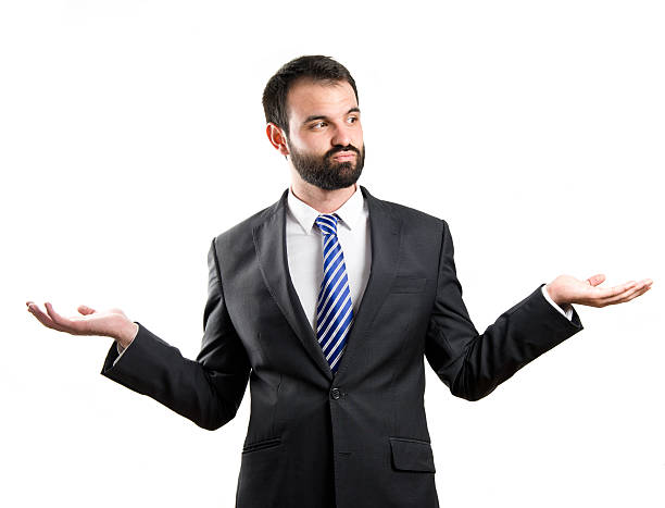 istock Businessman making a balance gesture over white background 461093549