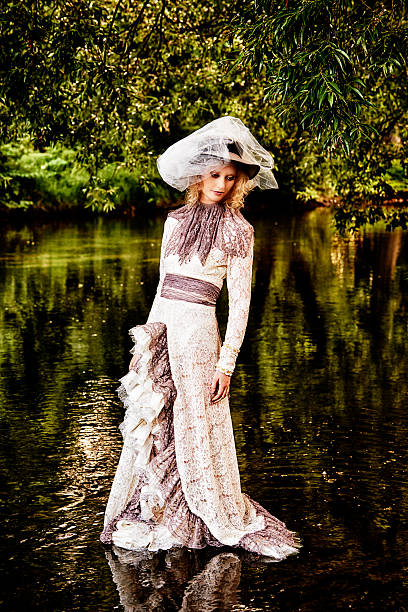 istock Woman in an oldfashioned dress 461108749