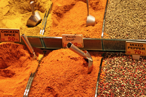 Different multi colored spices for sale at a spice market in Istanbul Turkey