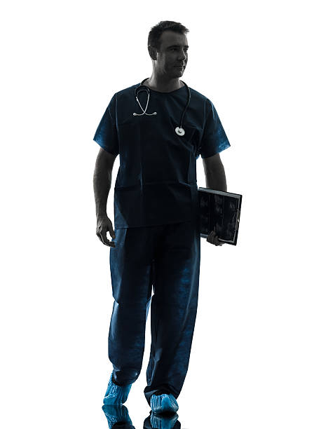 istock doctor man silhouette walking full length 461121265