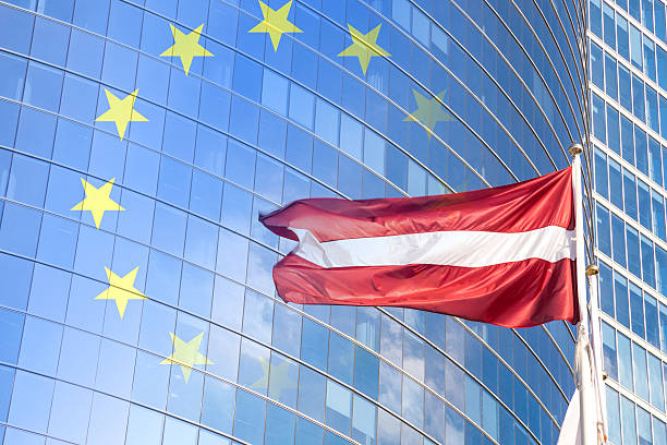 istock Latvia flag against glass skyscraper 461130767