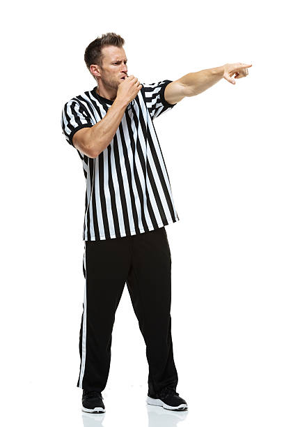istock American football referee pointing and whistling 461130813