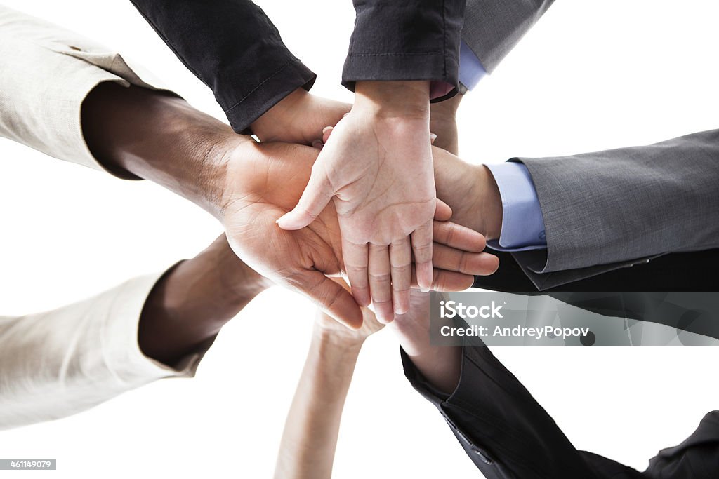 Businesspeople Stacking Hands Low Angle View Of Multiracial People Stacking Hands Over Each Other Adult Stock Photo
