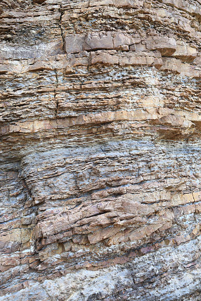 istock Layered rock on high steep sea bank 461150523