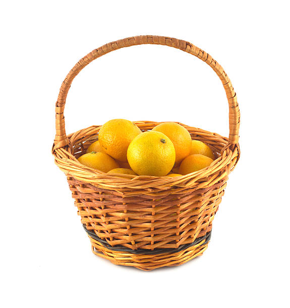 istock Tangerines in brown wicker basket isolated 461150555