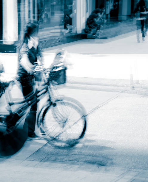 istock Riding a bike on city street 461151663
