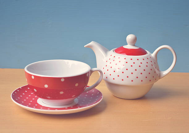 istock Red polka dot kettle and cup of tea vintage retro 461151829