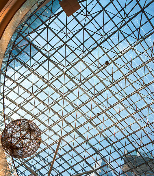 istock View through armored glass ceiling on blue sky 461153343