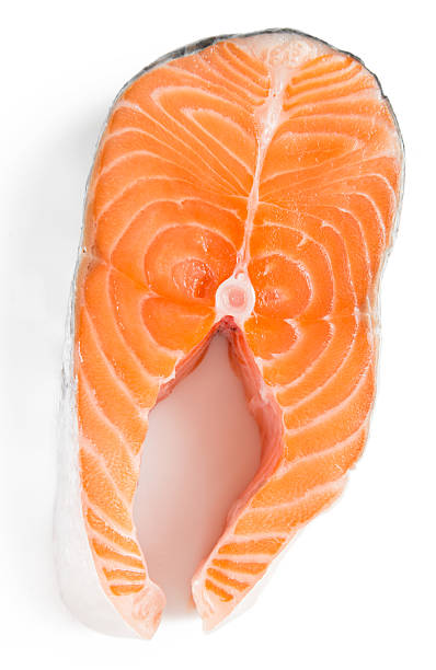 istock Fresh raw salmon isolated on white background 461155679
