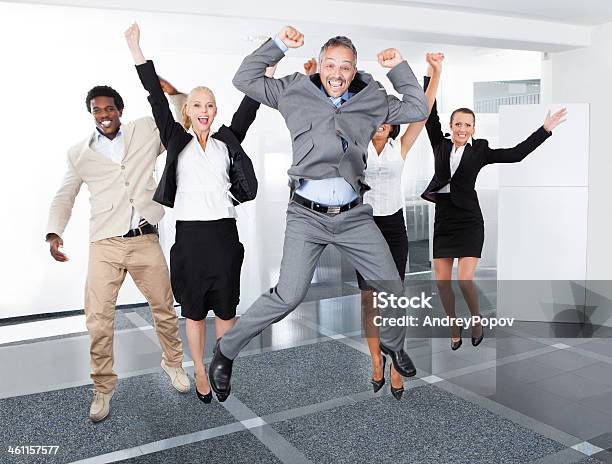 Happy Multiracial Businesspeople Stock Photo - Download Image Now - Jumping, Joy, Business Person