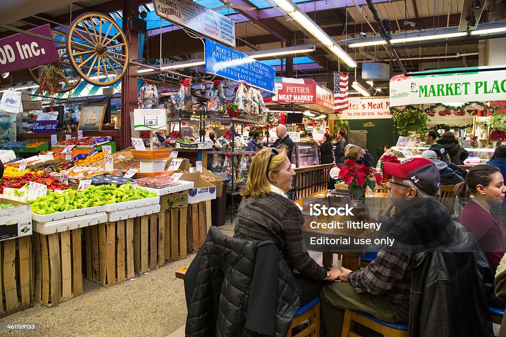 Arthur Avenue The Bronx Bronx, New York, USA - December 28, 2013:  Diners at indoor Italian market on Arthur Ave in the Bronx in New York City.  Arthur Ave is a well known and visited for being the Little Italy of the Bronx. The Bronx Stock Photo