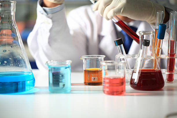 istock Hand Holding Chemical Test Tube 461165687