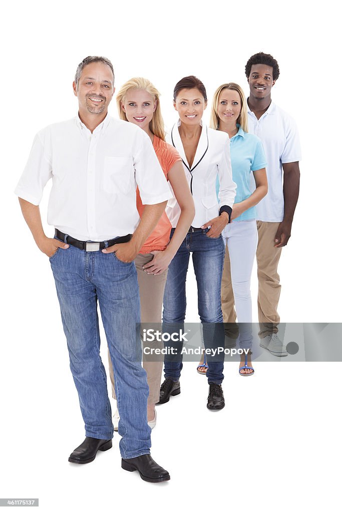 A group of people standing in a line on a white background Group Of Multi-racial People Standing In A Row On White Background Waiting In Line Stock Photo