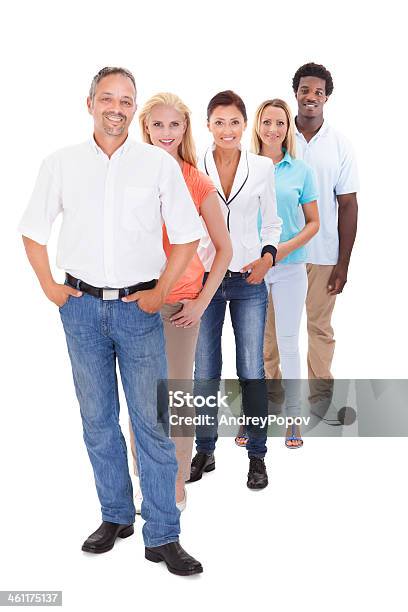 A Group Of People Standing In A Line On A White Background Stock Photo - Download Image Now