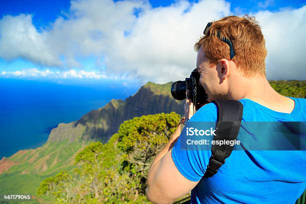 Tourist Takes A Photo Of Na Pali Coast Stock Photo - Download Image Now - Adult, Adults Only, Camera - Photographic Equipment