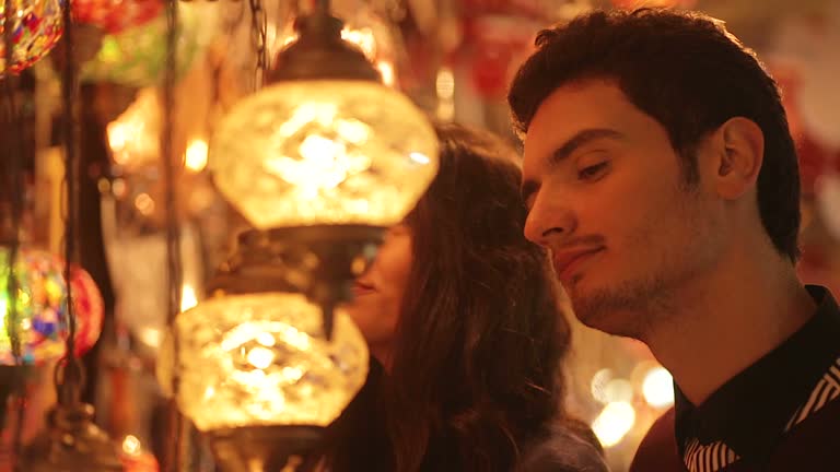 Couple buying turkish lamps