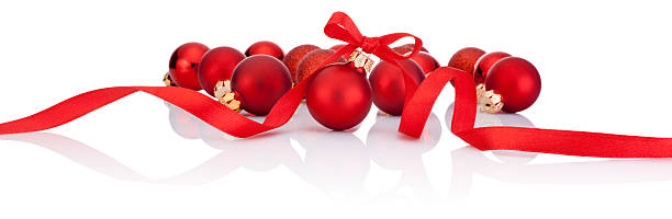 istock Red Christmas balls with ribbon bow Isolated on white background 461186101