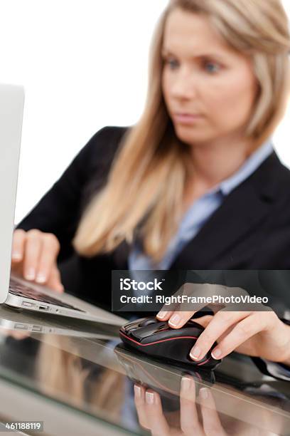 Beautiful Young Businesswoman Using Laptop Stock Photo - Download Image Now - Adult, Adults Only, At The Edge Of