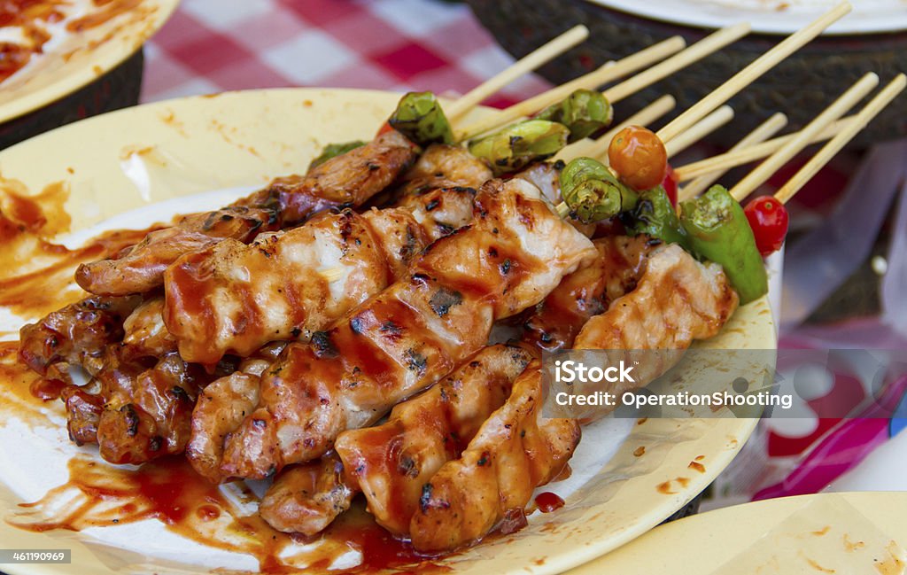 Barbecue Barbecue with delicious grilled meat on dish Backgrounds Stock Photo