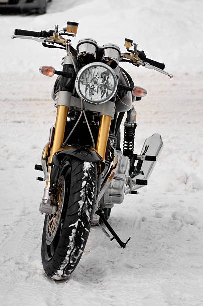 Black Norton Commando 961SE - Front View Fonthill, Ontario, Canada - December 15, 2013: A brand new 2013 Norton Commando 961 SE motorcycle poses outside in a driveway in the snow in Fonthill, Ontario Canada norton brand name stock pictures, royalty-free photos & images