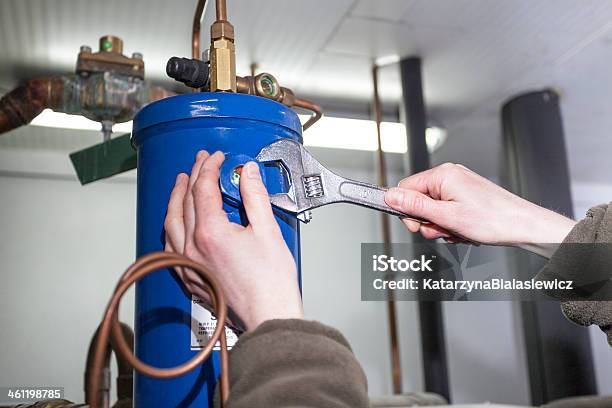 Repair The Condenser Stock Photo - Download Image Now - Installing, Water, Inside Of