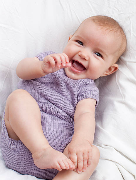 cute 4-month old baby teasing her parents smiling baby for happy parenting teasing photos stock pictures, royalty-free photos & images