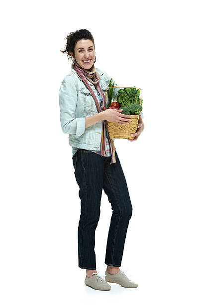 istock Woman with a grocery shopping basket 461203145