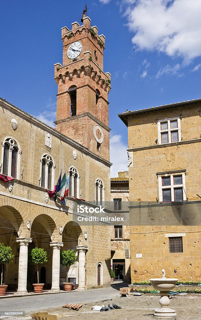 City Hall and Palazzo Borgia in Pienza, Tuscany, Italy Piazza Pio II with Palazzo Pubblico (City Hall) and Palazzo Borgia clearly visible. Pienza located in the Val d'Orcia (Orcia valley) in Tuscany Region was rebuilt from a village called Corsignano, which was the birthplace (1405) of Aeneas Silvius Piccolomini who later became Pope Pius II. Once he became Pope, Piccolomini had the entire village rebuilt as an ideal Renaissance town. Palace Stock Photo