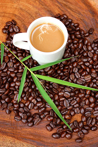 istock Coffee and beans on the wooden background. 461209933