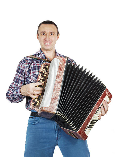 istock Man plays accordion 461211511