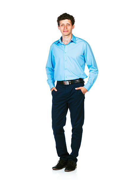 istock Happy young businessman standing with his hands in pockets 461212715