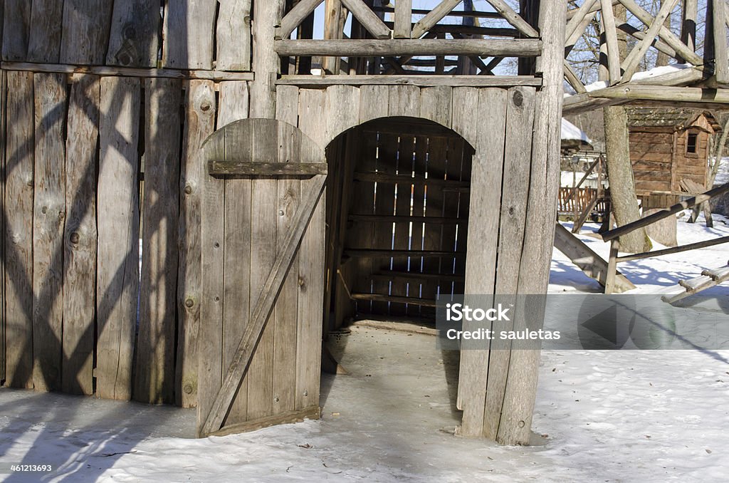 wooden playground house door cover ice snow winter wooden playground house door covered with ice and snow in winter. Activity Stock Photo