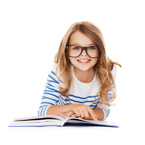 istock smiling little schoolgirl in glasses with book 461214567